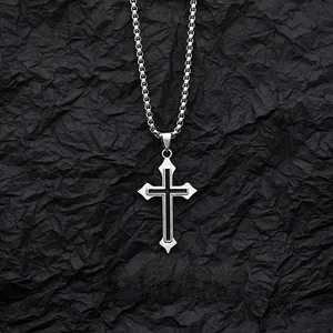 Macro shot of double-layer cross pendant with black inlay and stainless steel box chain
