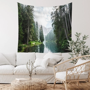 Detail showing high-quality nature print on tapestry with mountain and forest landscape