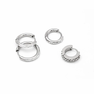 Silver hoop earrings set featuring crystal pavé details and chain link textures