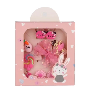 Detailansicht von rosa Haarschmuckset für Kinder mit Schleifen und Clips in Geschenkbox