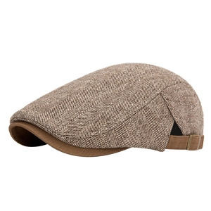 Brown herringbone tweed newsboy cap with adjustable strap and vintage british style