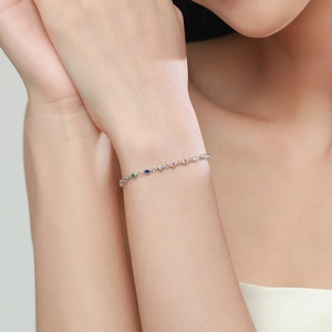 Elegant S925 sterling silver bracelet featuring colorful rainbow gemstones on thin chain