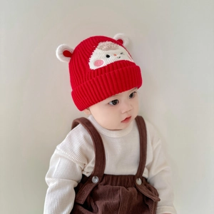 Toddler winter warm knit hat in red paired with brown corduroy overall shorts