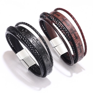 Braided leather cross bracelet for men with magnetic clasp on white background