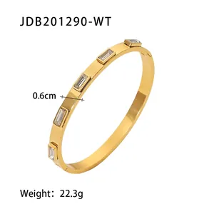 Vergulde roestvrijstalen armband met vijf rechthoekige zirkoonstenen 0,6 cm breed