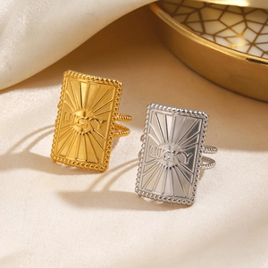 Golden and silver LUCKY rectangular geometric stainless steel adjustable rings on silk