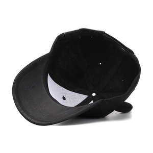 Detail view of the interior 100% acrylic fabric label on a camo horn baseball cap