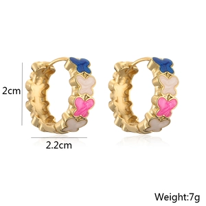 Detailed view of butterfly hoop earrings in 18K gold with enamel colors and measurements