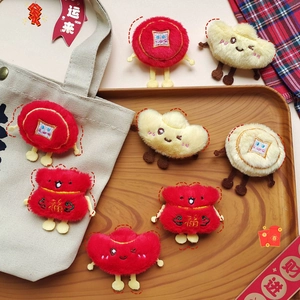 Macro detail of plush Chinese New Year charms with Fu embroidery and gold ingots