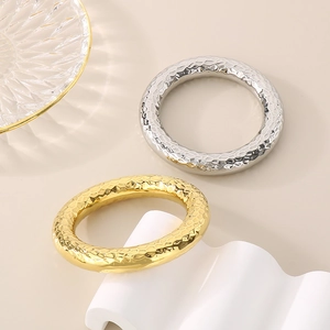 Textured 18k gold and silver stainless steel hollow bangles in retro minimalist style