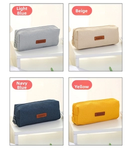 Detail view of four-color canvas pencil bags with basic logo in a grid layout
