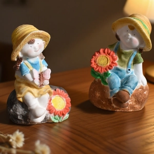 Detail of DIY sunflower boy and girl silicone candle molds for creative gypsum dolls
