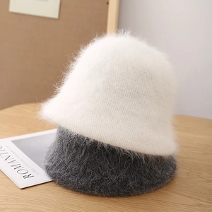 Winter fluffy angora wool blend bucket hat in white and dark grey colors with soft texture