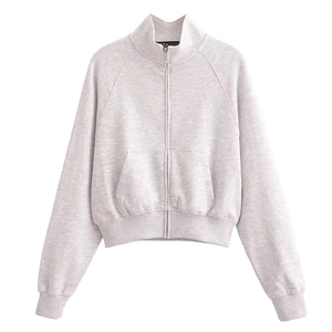 Detail view of light grey zip-up sweatshirt with stand collar and ribbed cotton cuffs