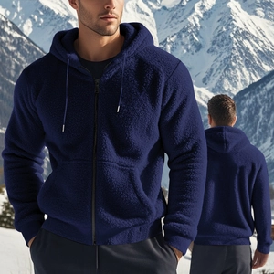 Detail of navy blue sherpa zip-up hoodie featuring warm lining and drawstring hood