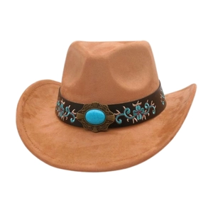 Close-up of western cowboy hat with ethnic floral band and turquoise gemstone detail