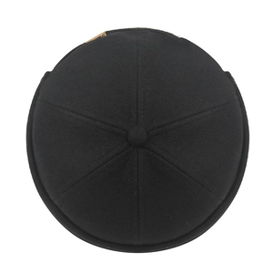 Overhead view of black wool miki hat with classic 6-panel design and side leather patch