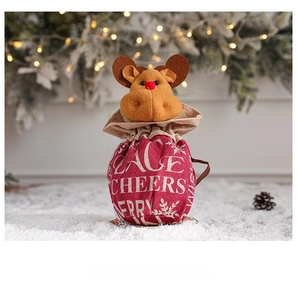 Close-up of a festive reindeer Christmas gift bag with a warm linen texture and 3D design