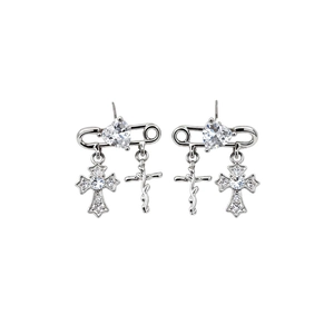 Silver cross drop earrings with heart zircon and safety pin design on white background