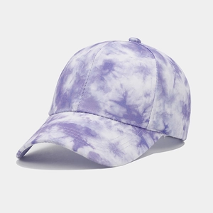 Detail of purple and white tie-dye cotton fabric on a six-panel baseball cap