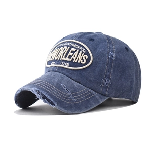 Washed vintage baseball cap in dark blue with New Orleans embroidery and distressed detail