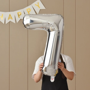 Detail of 40-inch silver number 7 foil balloon for birthday party decorations