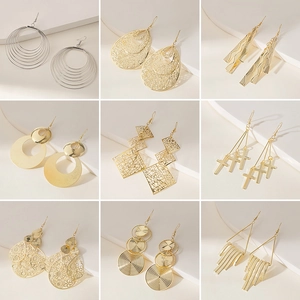 Multiple styles of bohemian hollow geometric gold and silver earrings in a grid layout
