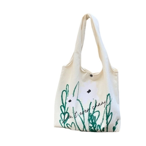 Japanese style chamomile print canvas tote bag with floral patterns and lettering