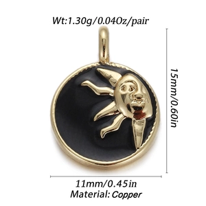 Detail of copper celestial sun and moon charm with black enamel and dimensions