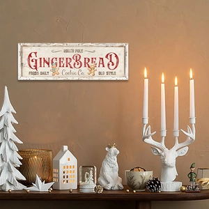 North Pole Gingerbread Christmas wooden sign hanging on wall with holiday decor