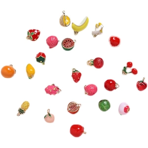 Assorted gold-plated fruit pendants featuring colorful enamel strawberry and cherry charms