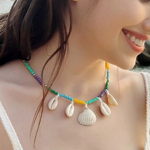 Bohemian colorful beaded necklace with natural white shells for summer beach vacations