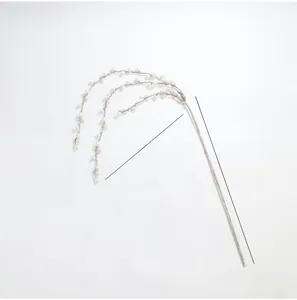 Detailed view of 50cm silver wire branch with white faux pearls for festive decoration