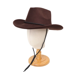 Close-up of a vintage dark brown wool felt cowboy hat with adjustable black chin strap