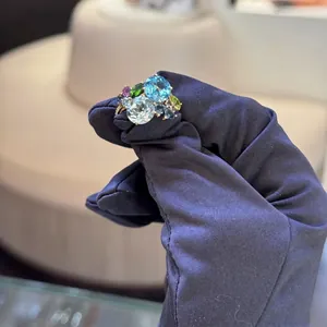 Chic geometric cutout gold ring with vibrant multi-gemstone zircon cluster design