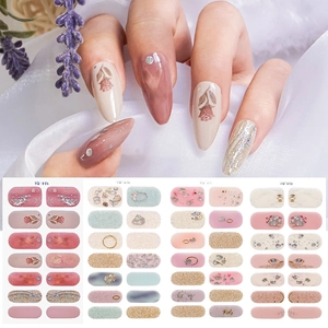 Floral nail wraps set with rose patterns, gold flakes and marble effects in four styles