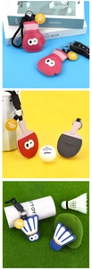 Detail of PU leather sports keychains featuring boxing glove and rackets with stitching