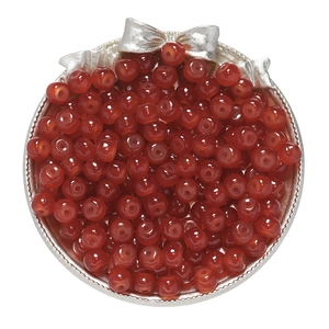 Macro shot of 8x7mm translucent red apple glass beads for DIY jewelry making