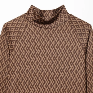 Ensemble de ski thermique marron pour femme avec col montant et motif géométrique