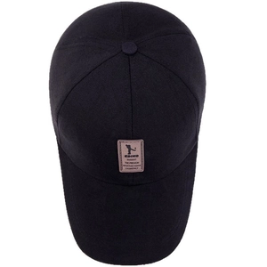 Classic black cotton baseball cap with a brown leather patch showing a golfer silhouette