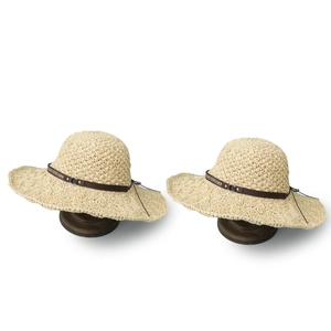 Women's wide brim straw sun hat with leather belt and silver buckle in cream white