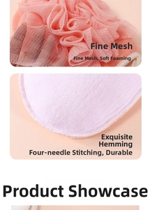 Close-up of pink bath ball with fine mesh texture and durable four-needle lockstitch edge