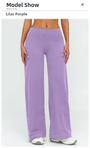 Detail of lilac high-waisted wide-leg yoga pants with brushed texture and relaxed fit