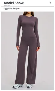 Eggplant purple yoga set featuring a slim long sleeve top and high waist wide leg pants
