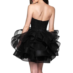 Elegant black strapless mini evening dress with tiered organza skirt and lace bodice