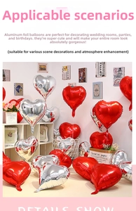 Detail of red and silver heart-shaped foil balloons with metallic finish for party decor