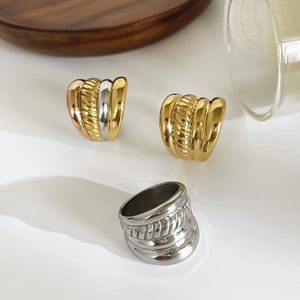 Three-tone 18K gold plated stainless steel chunky ribbed rings set in gold and silver