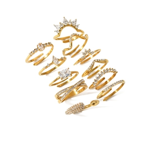 10-piece gold stainless steel stacking ring set with zirconia accents and crown design