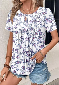 Detail of the keyhole neckline and blue floral pattern on this casual summer blouse
