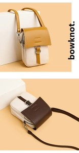 Detail of color-block mini crossbody bags in yellow and brown with magnetic flip covers
